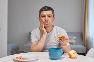 sharp pain when eating or drinking